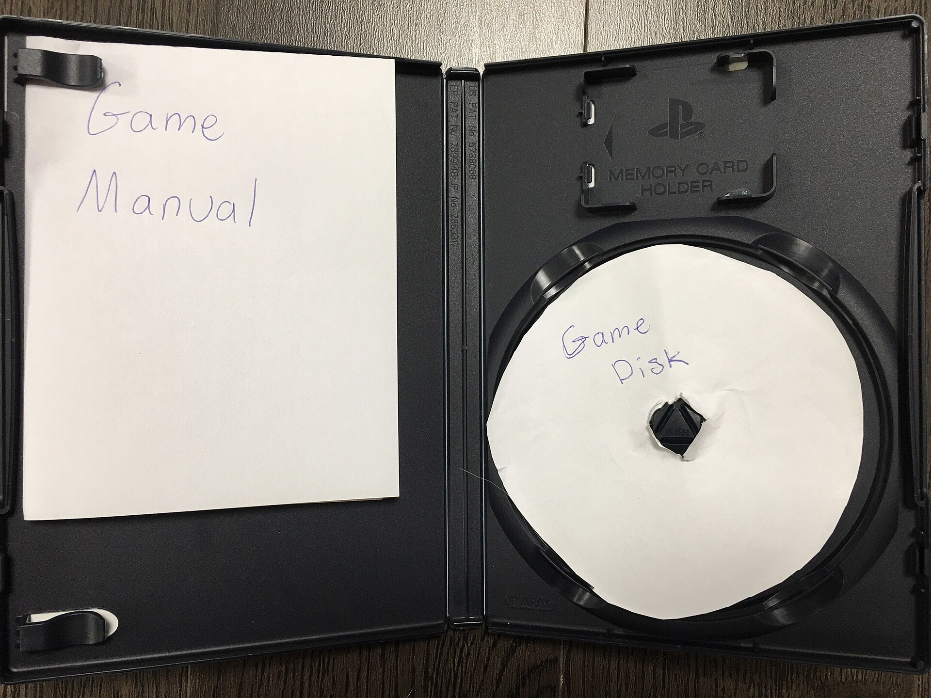 An open PlayStation 2 game case showing the disc sitting inside its holder